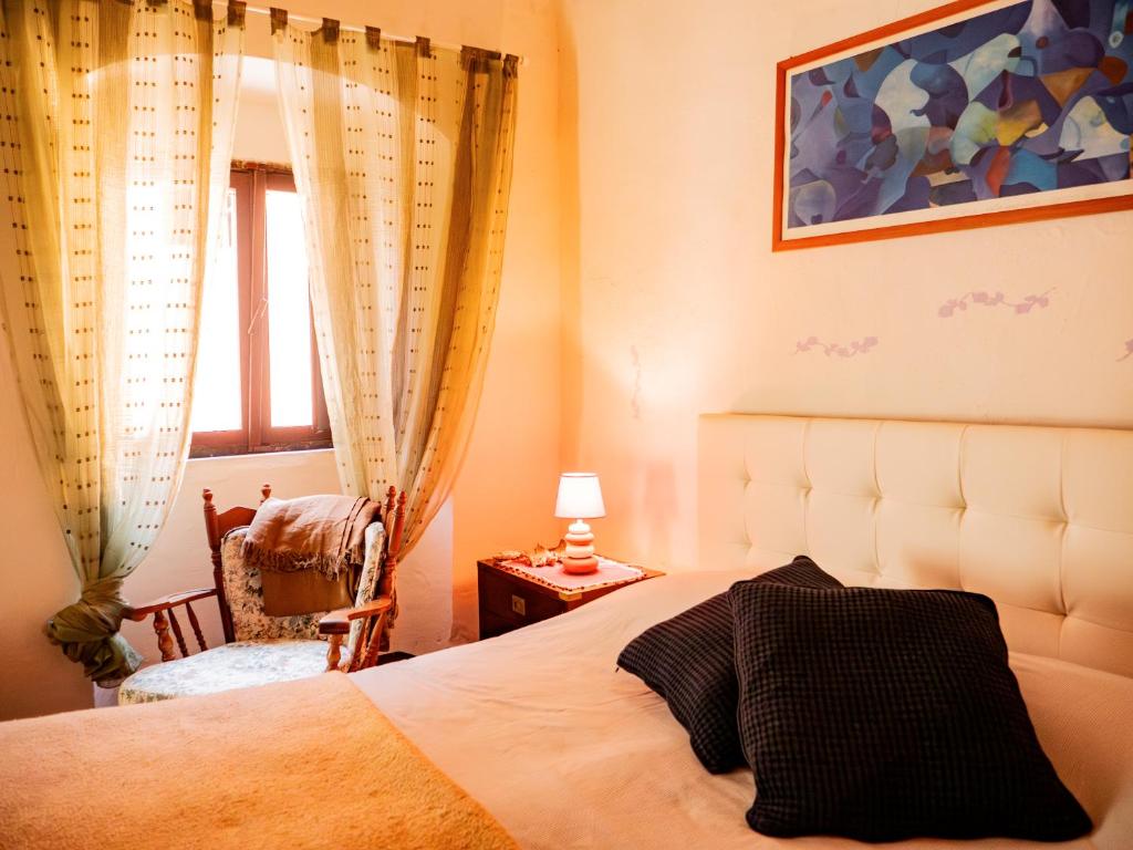 Postel nebo postele na pokoji v ubytování Casa Tullio
