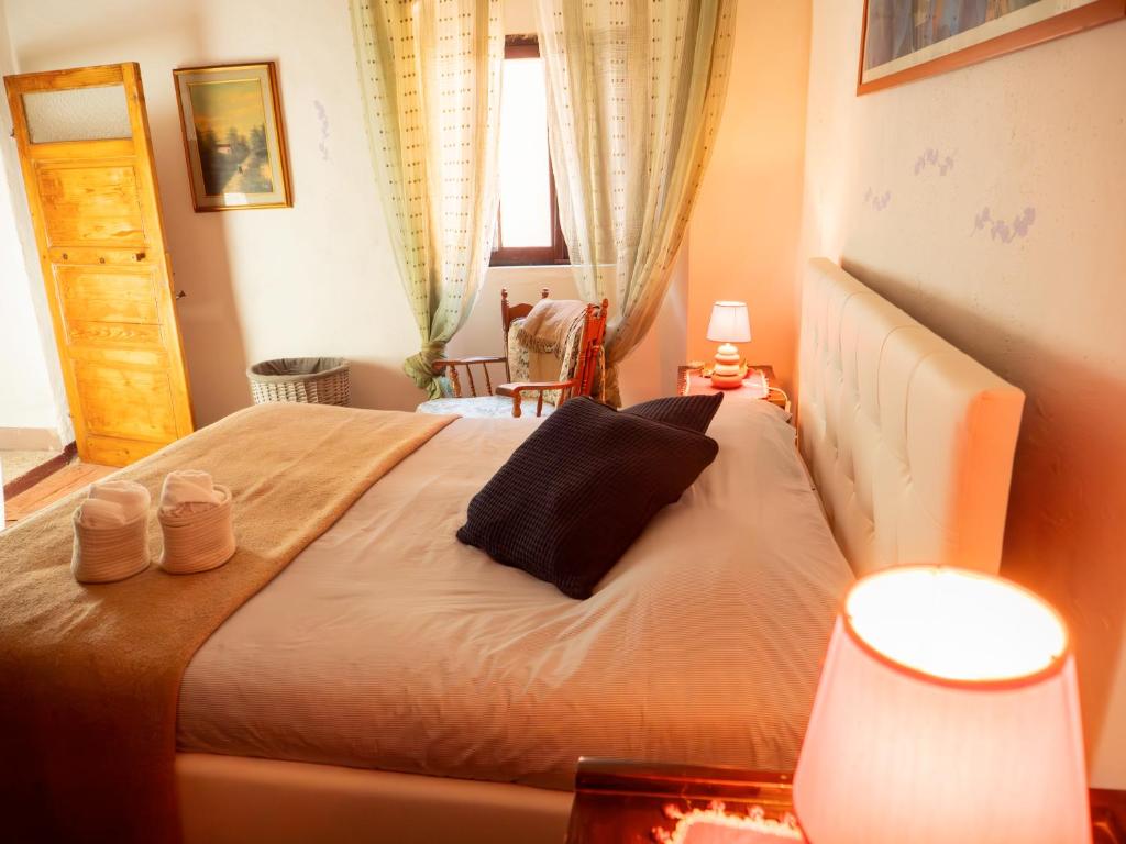 Postel nebo postele na pokoji v ubytování Casa Tullio