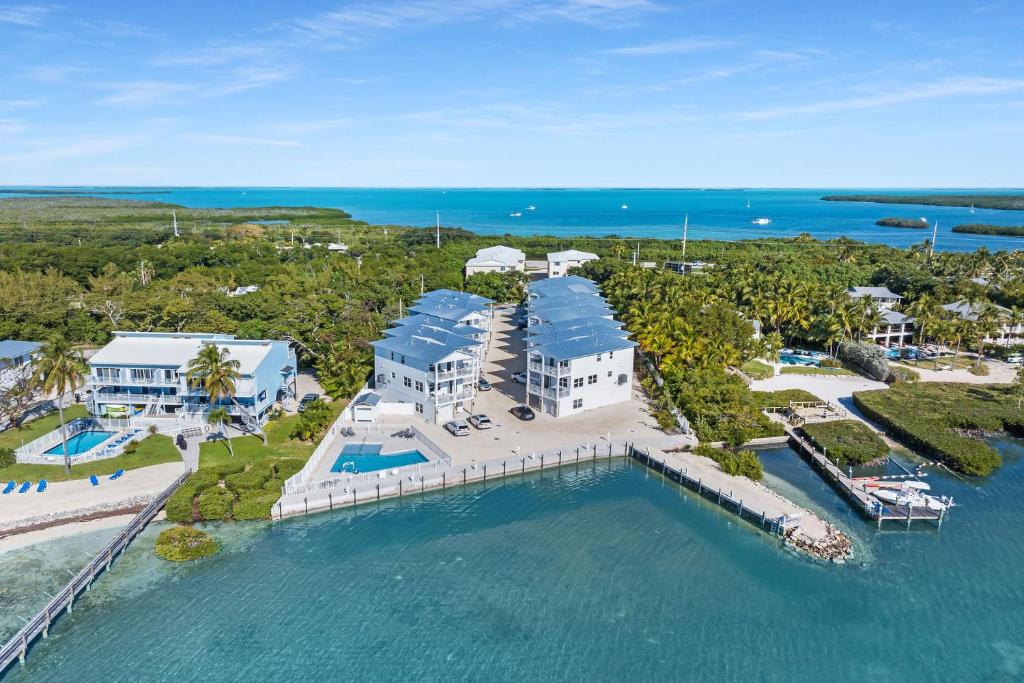 an aerial view of a large house on the water at Peaceful Palms A2 in Islamorada