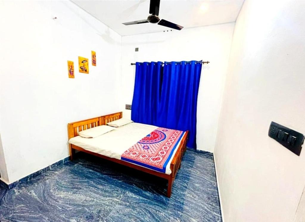 Postel nebo postele na pokoji v ubytování Raelyn's Homestay