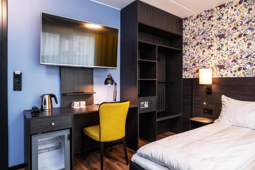 Postel nebo postele na pokoji v ubytování Thon Hotel Tromsø