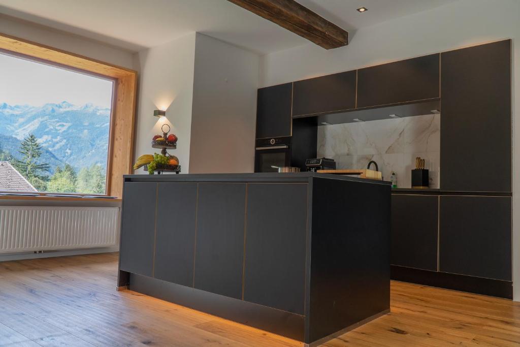 Kuchyň nebo kuchyňský kout v ubytování Chalet Schmelz Huette mit Sauna und Garten