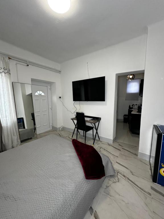 TV a/nebo společenská místnost v ubytování Airport17 B&B