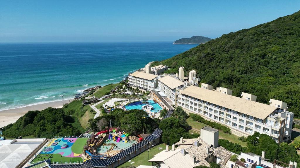 an aerial view of a hotel and the ocean at Costao do Santinho Resort All Inclusive in Florianópolis