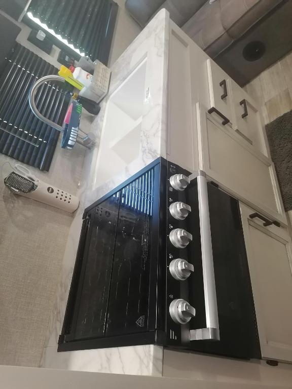 Kuchyň nebo kuchyňský kout v ubytování Kyan caravan