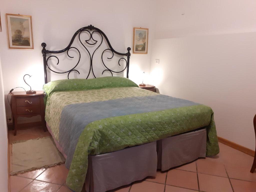 Postel nebo postele na pokoji v ubytování Agriturismo Podere Zollaio
