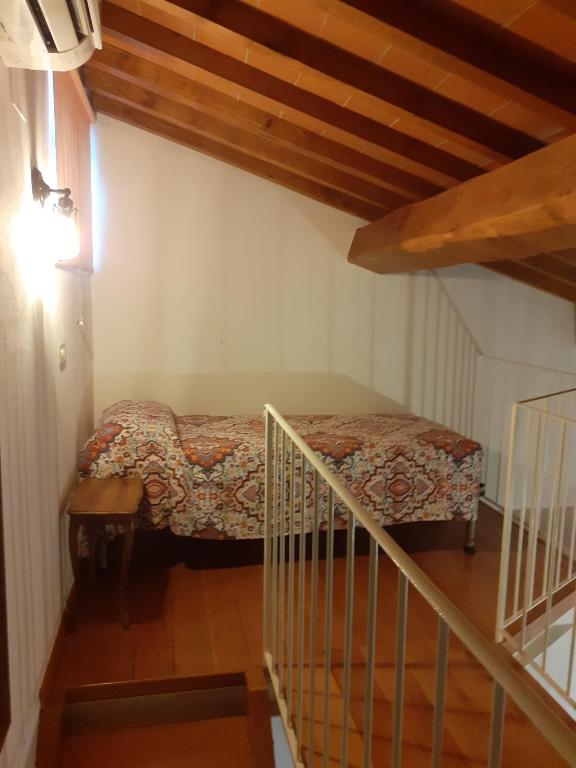 Postel nebo postele na pokoji v ubytování Agriturismo Podere Zollaio