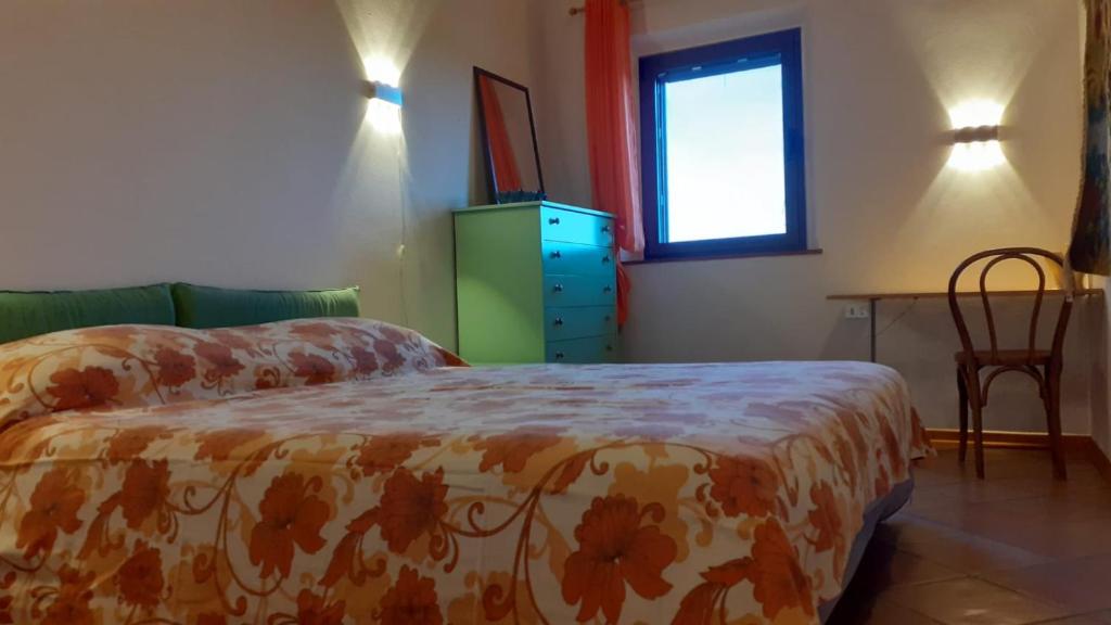 Postel nebo postele na pokoji v ubytování Agriturismo Podere Zollaio