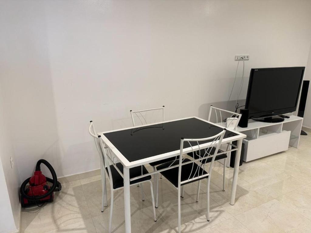 TV a/nebo společenská místnost v ubytování Coralia Bel F3 clim wifi parking privé Iptv