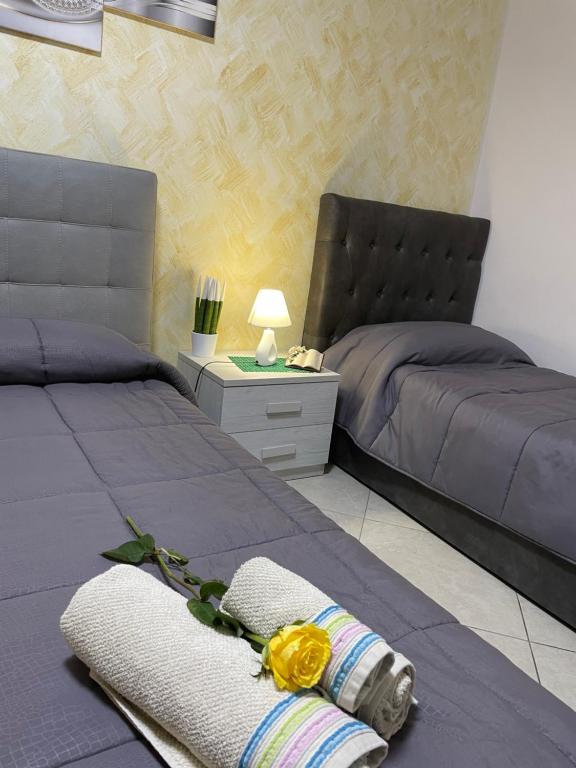 Łóżko lub łóżka w pokoju w obiekcie B&B Bovianum