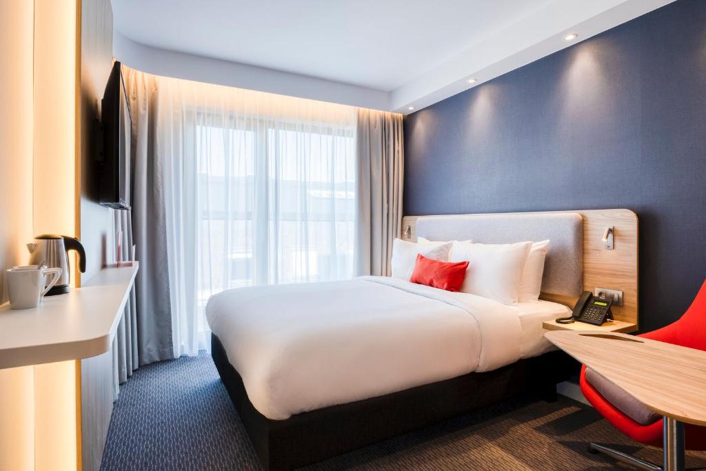 Postel nebo postele na pokoji v ubytování Holiday Inn Express Antwerp - City Centre by IHG