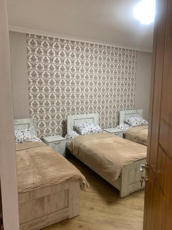 Postel nebo postele na pokoji v ubytování Sweet Home