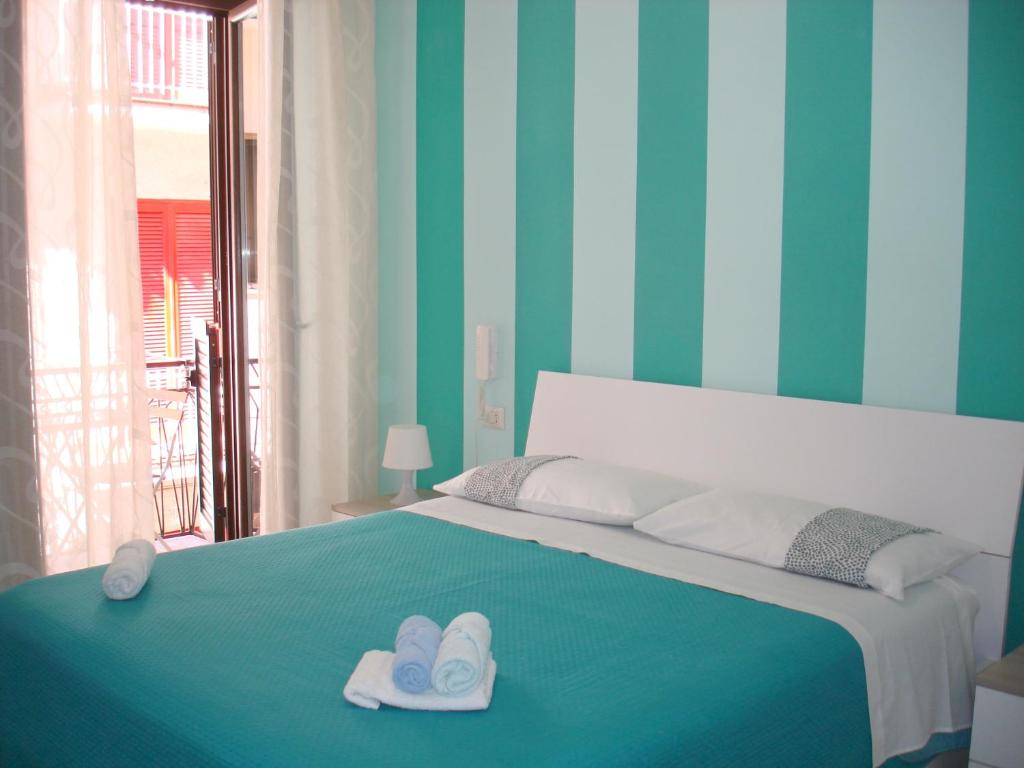Кровать или кровати в номере B&B Margherita