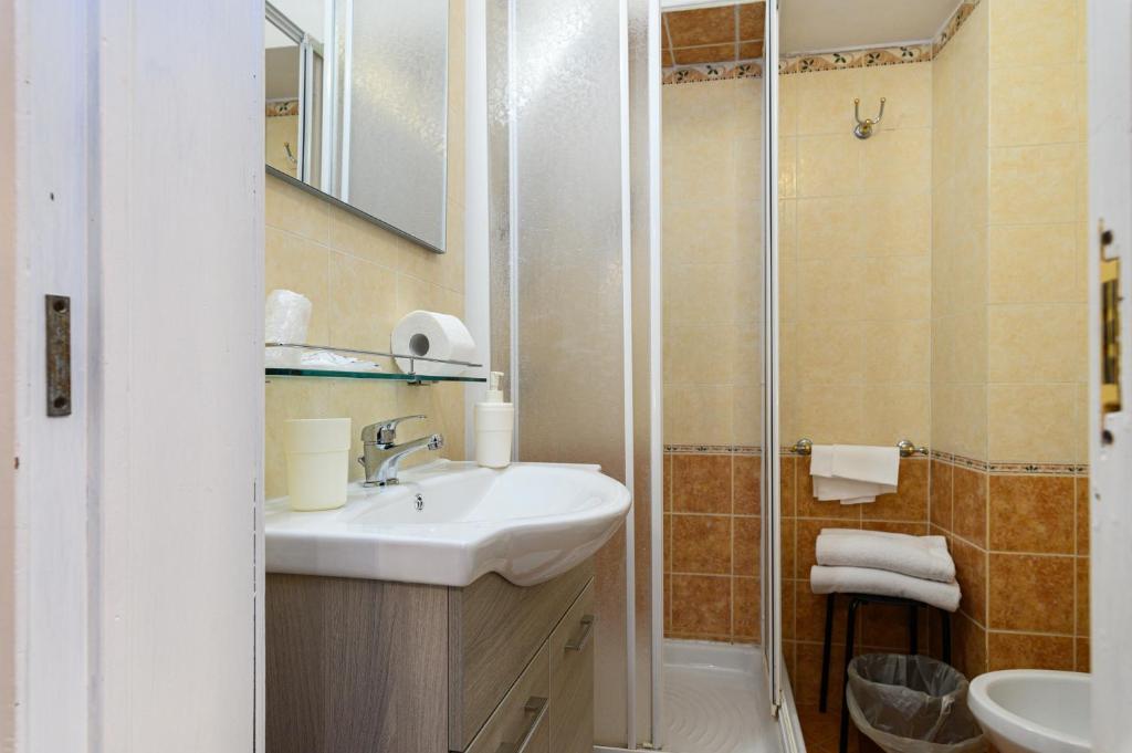 Ванна кімната в Hotel Julia
