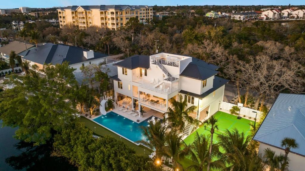 an aerial view of a house with a swimming pool at Siesta Sun Sets in Siesta Key