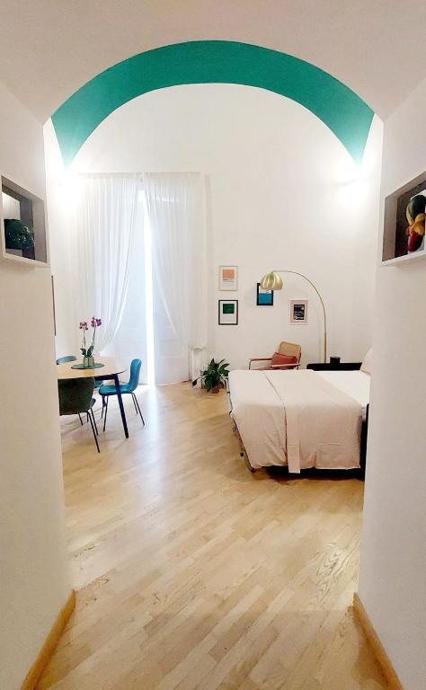 Telewizja i/lub zestaw kina domowego w obiekcie Maison In Centro