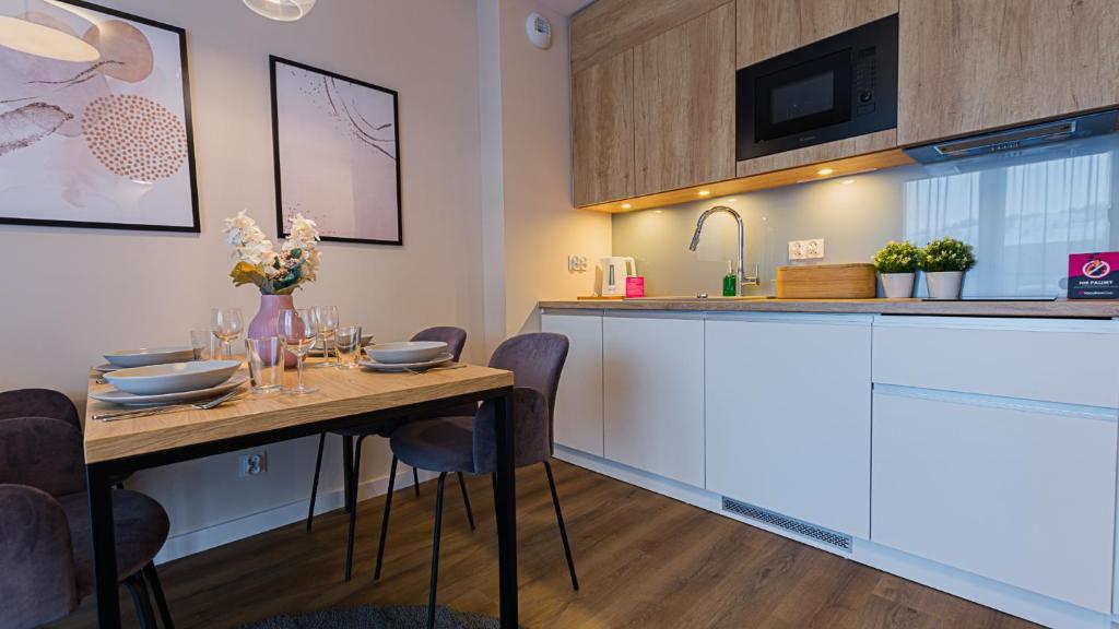 Nhà bếp/bếp nhỏ tại VacationClub - Apartamenty Zakopiańskie Apartament 133