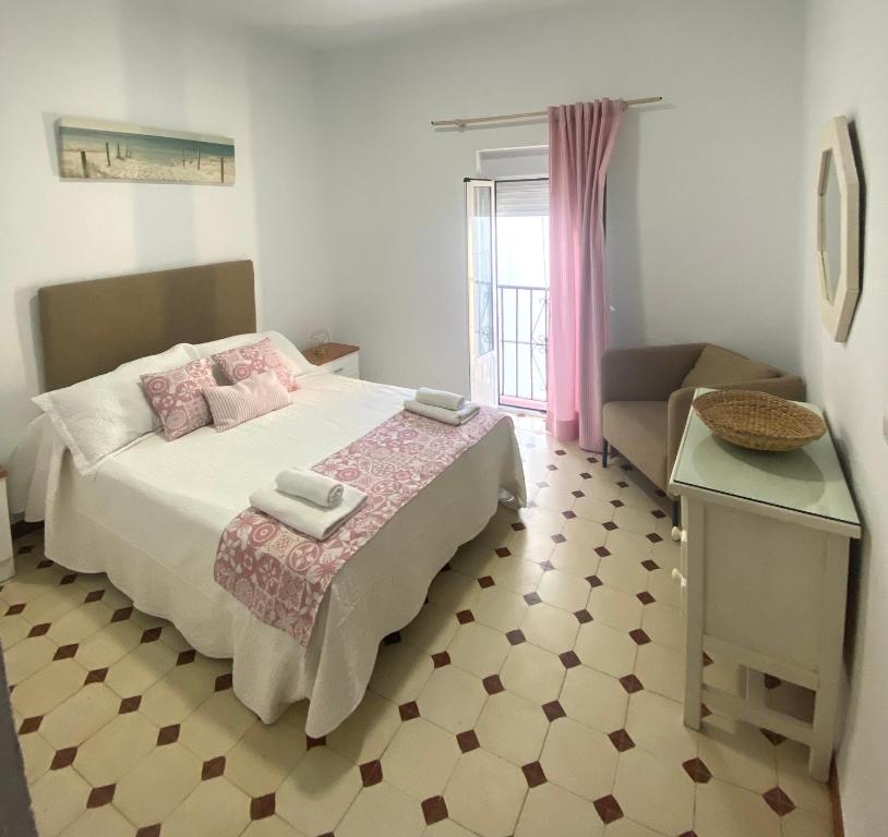 Postel nebo postele na pokoji v ubytování Casa Calle