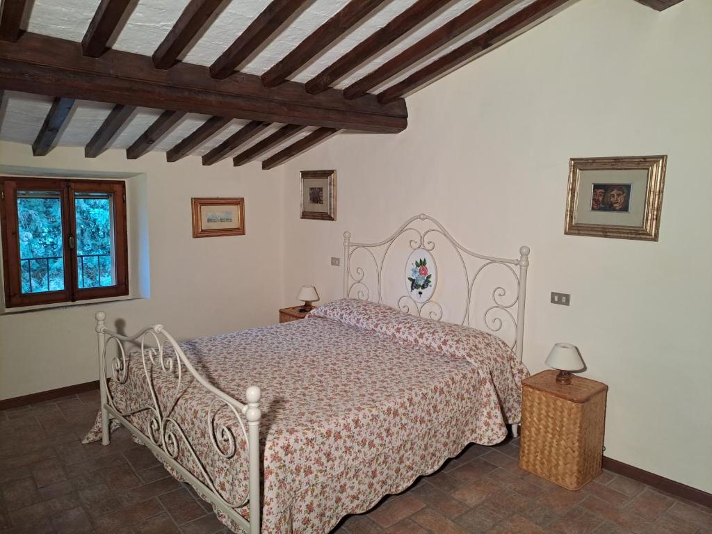 Posteľ alebo postele v izbe v ubytovaní Podere Il Caggio Rooms