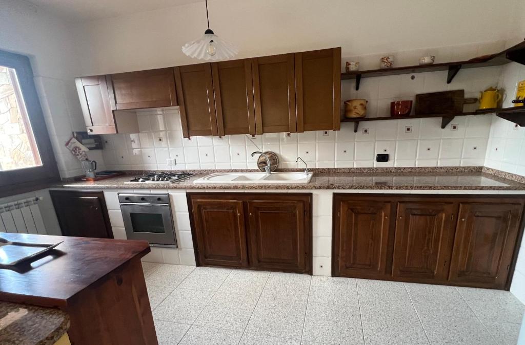 Kuchyň nebo kuchyňský kout v ubytování Casa Casteddina