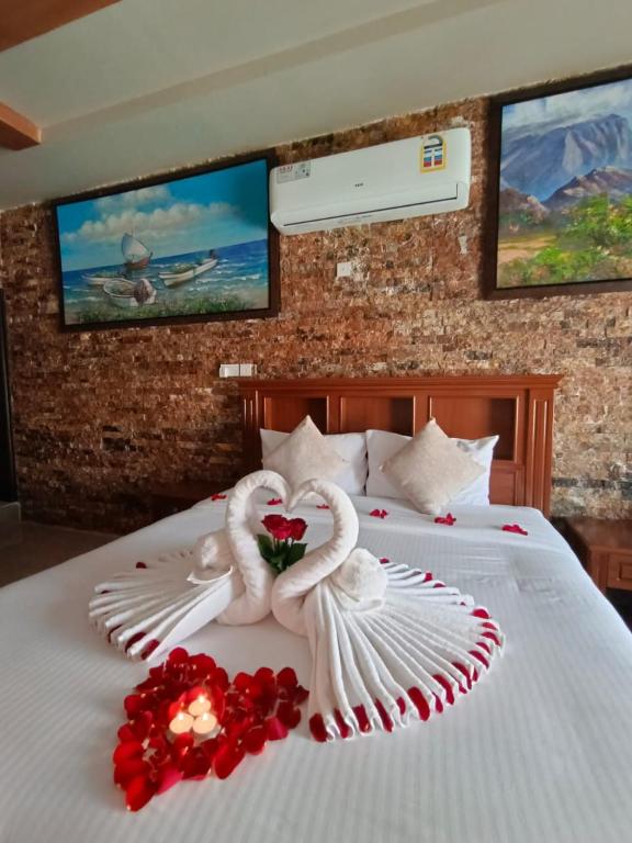 Postel nebo postele na pokoji v ubytování Durrat Nizwa Inn