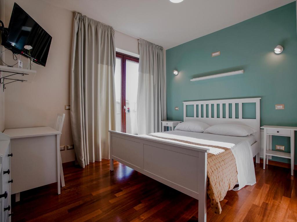Łóżko lub łóżka w pokoju w obiekcie SIGIS HOTEL - Fiumicino