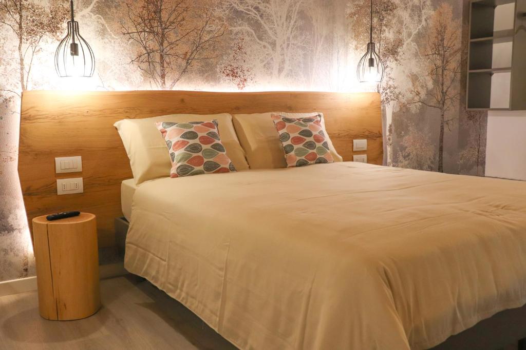 Postel nebo postele na pokoji v ubytování Albergo Ristorante Fratte