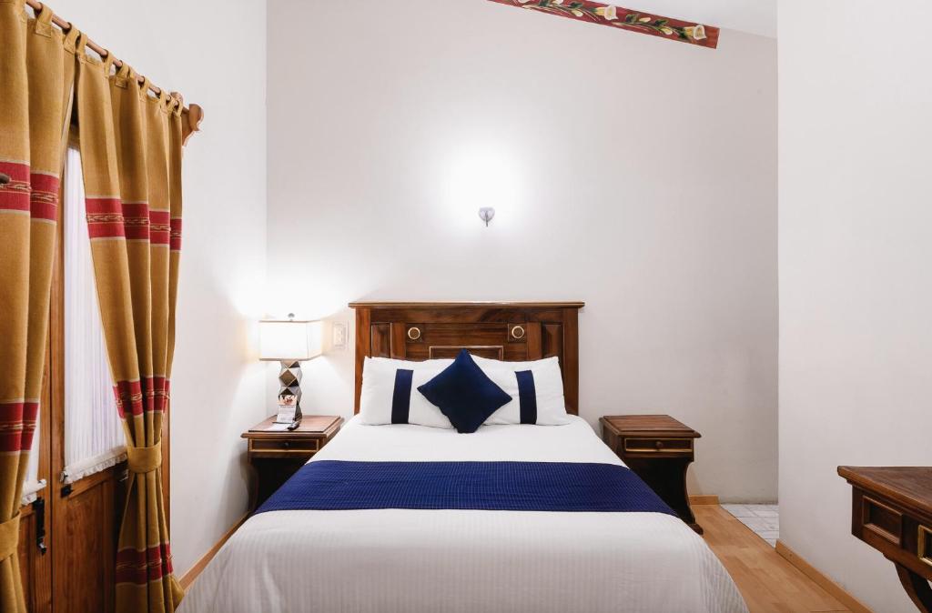 Postel nebo postele na pokoji v ubytování CASA MAYES