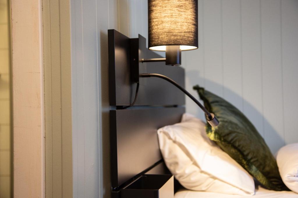 Postel nebo postele na pokoji v ubytování Tune Hotell Sarpsborg