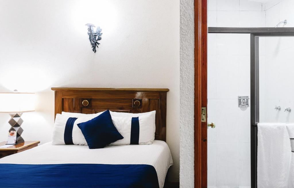 Postel nebo postele na pokoji v ubytování CASA MAYES