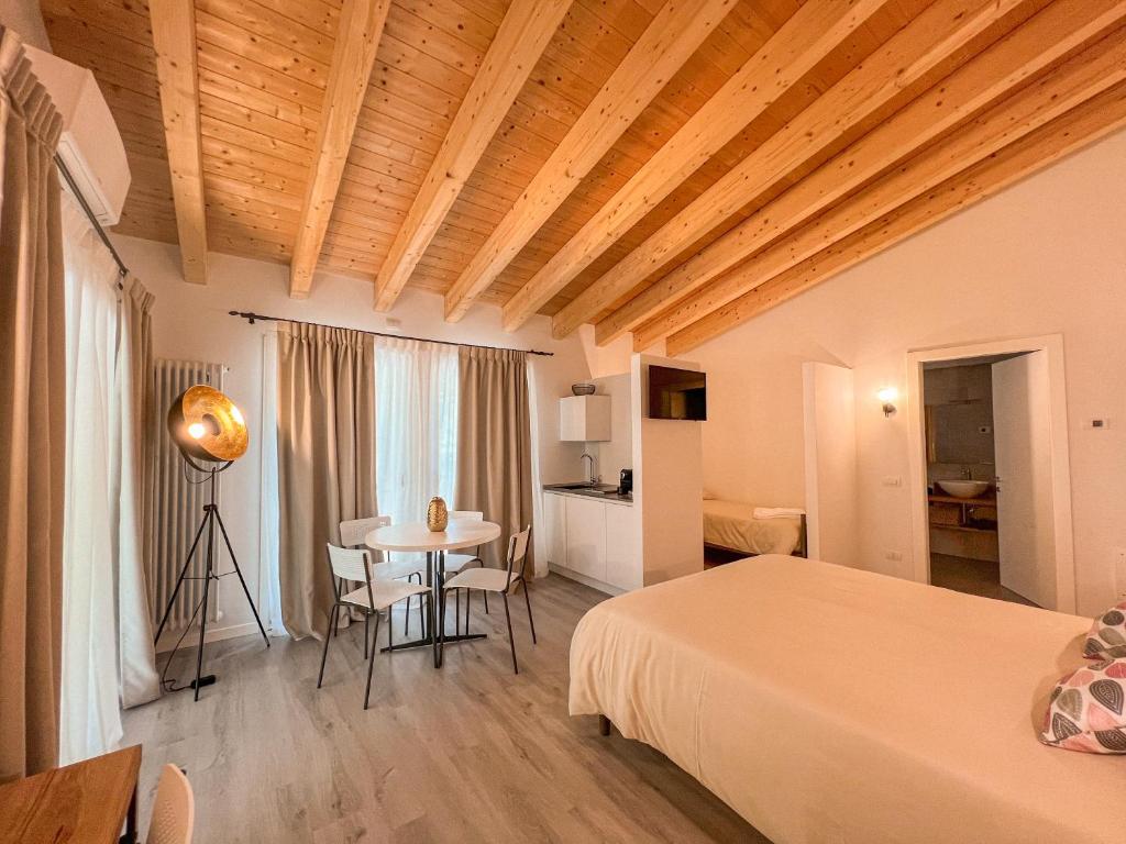 Postel nebo postele na pokoji v ubytování Albergo Ristorante Fratte