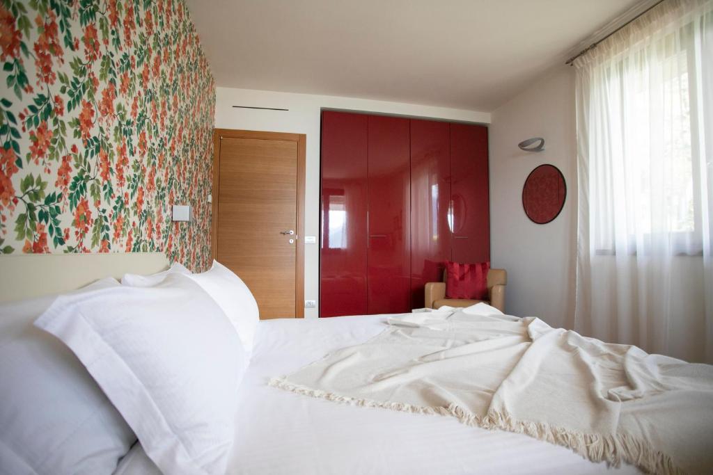 Posteľ alebo postele v izbe v ubytovaní Ai Ronchi B&B