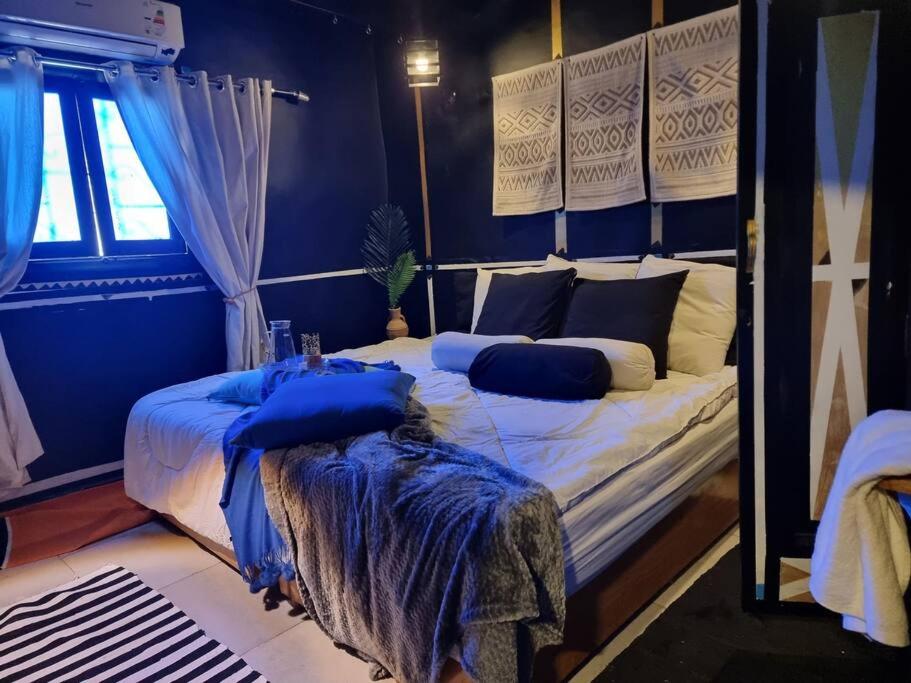 Кровать или кровати в номере G - House