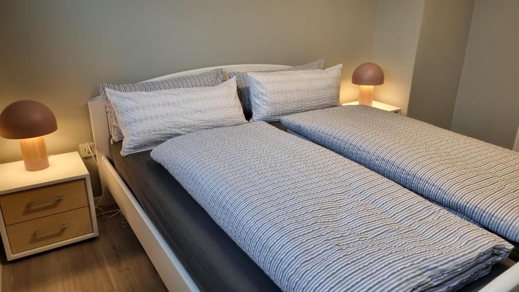 Postel nebo postele na pokoji v ubytování Haus Spökenkieker Loppersum