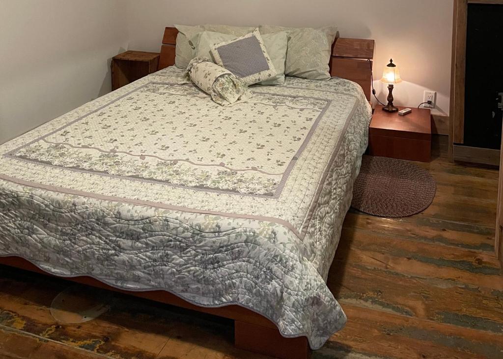 Postel nebo postele na pokoji v ubytování Le Trésor du Cachet