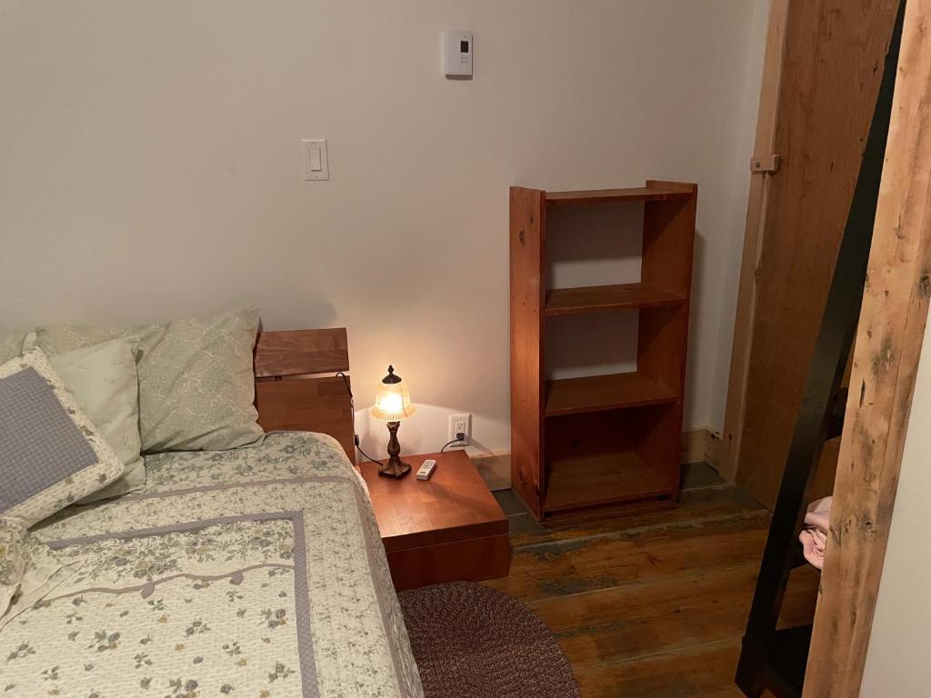Postel nebo postele na pokoji v ubytování Le Trésor du Cachet