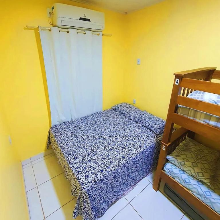 Postel nebo postele na pokoji v ubytování Pousada Hostel Mar e Sertão