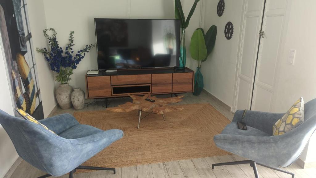 TV a/nebo společenská místnost v ubytování Casa Roberto Altea