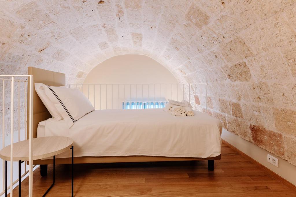Postel nebo postele na pokoji v ubytování Aeris Suite & Relax