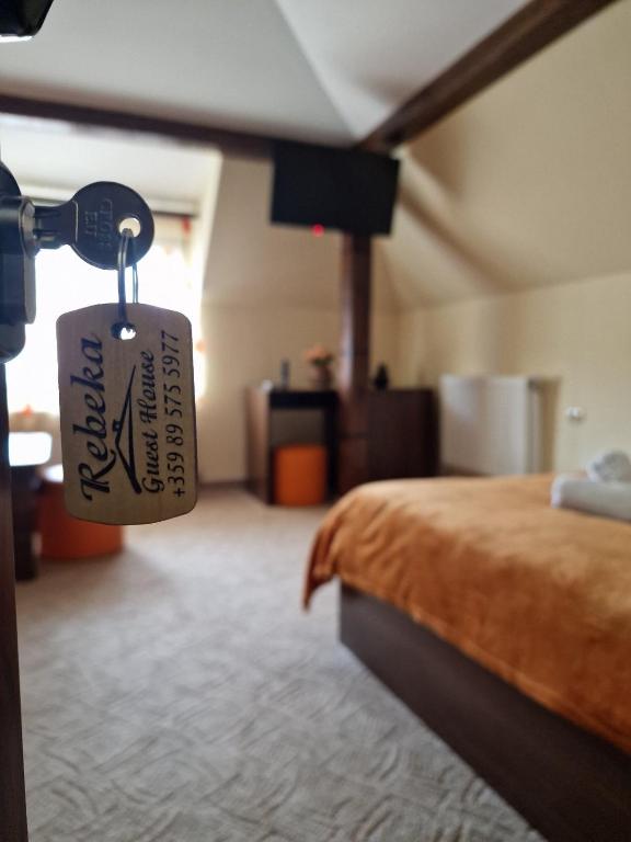 Postel nebo postele na pokoji v ubytování Rebeka Guest House