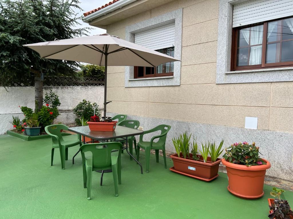 Κήπος έξω από το CASA DEL PALMERAL EN ORTIGUEIRA