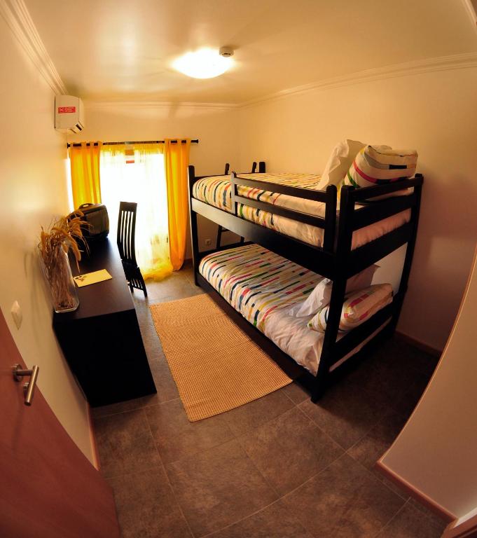 Uma cama ou camas num quarto em Casa dos Hospitalrios