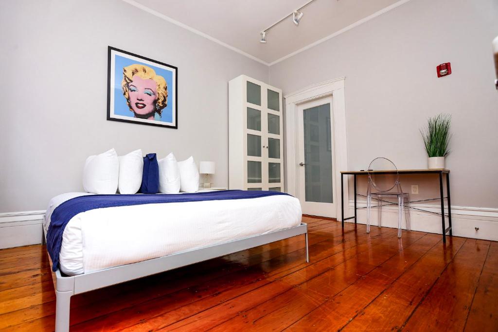 Voodi või voodid majutusasutuse Charming & Stylish Studio on Beacon Hill #9 toas