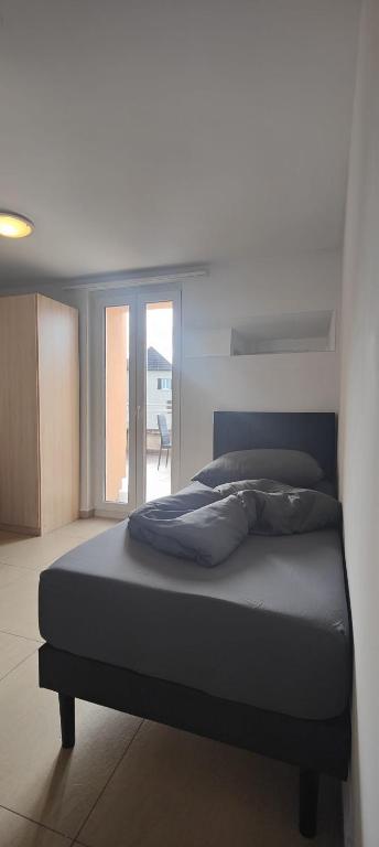 Postel nebo postele na pokoji v ubytování Gästehaus Spring