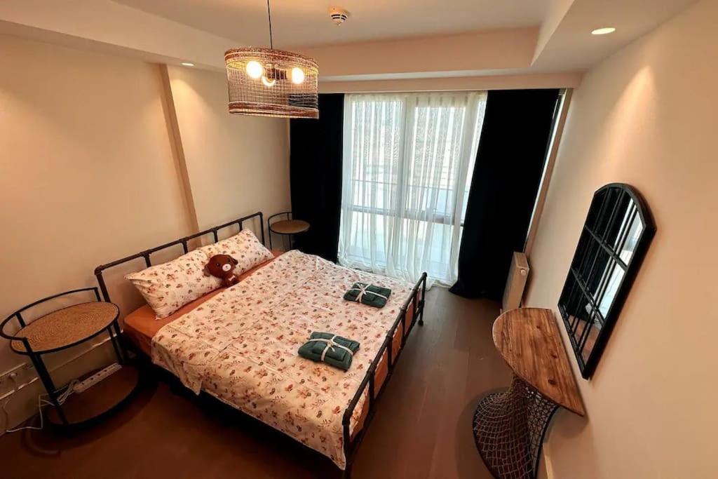 Ένα ή περισσότερα κρεβάτια σε δωμάτιο στο Şişli Bomonti İstanbul Merkez, Ücretsiz Otopark, Metro, 9