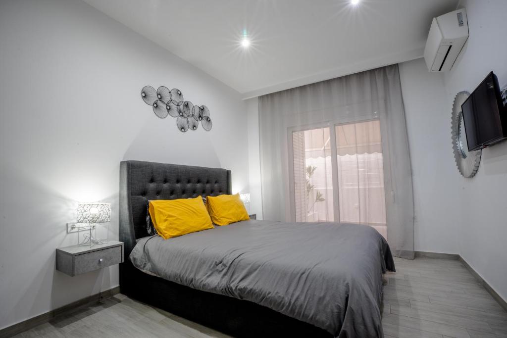 Posteľ alebo postele v izbe v ubytovaní Rodini House