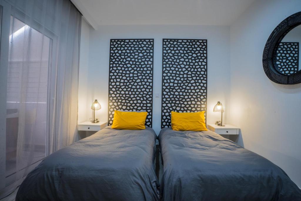 Posteľ alebo postele v izbe v ubytovaní Rodini House