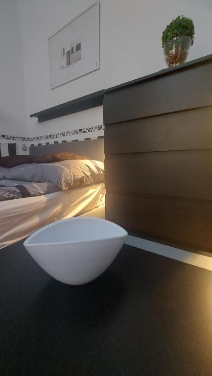 Posteľ alebo postele v izbe v ubytovaní Gecko Centrum Studio Apartman