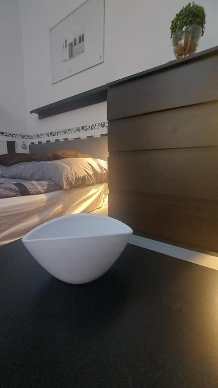 Posteľ alebo postele v izbe v ubytovaní Gecko Centrum Studio Apartman
