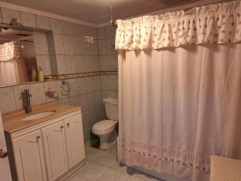 Koupelna v ubytování Habitación baño privado